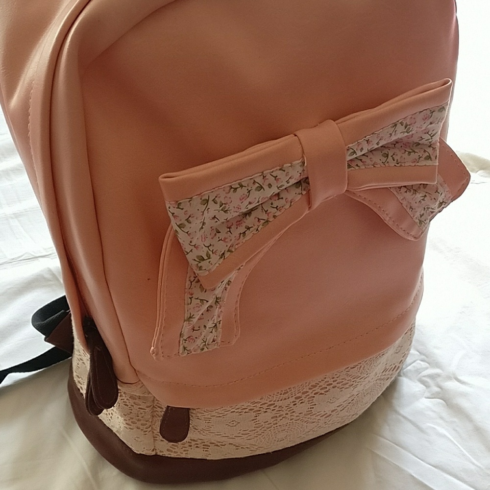 Cute pink/white bow tie backpack